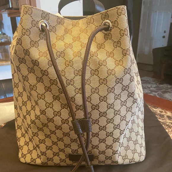 Gucci Handbags - Gucci Draw String Beige/Brown GG Canvas Backpack